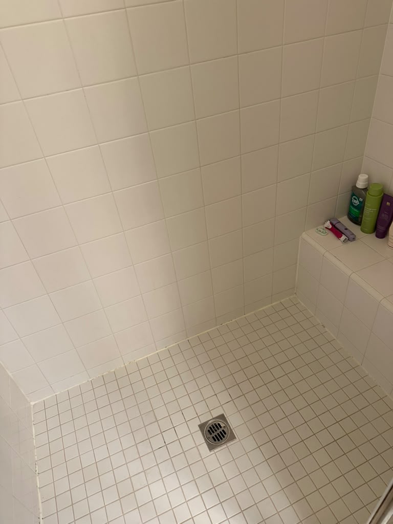After: Shower Grout Restoration by Empire Cleaning Services